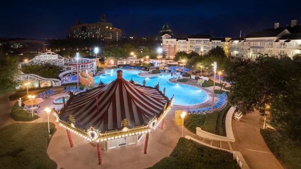 The pool area at The Boardwalk Inn at night